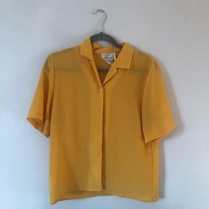 yellow button up shirt